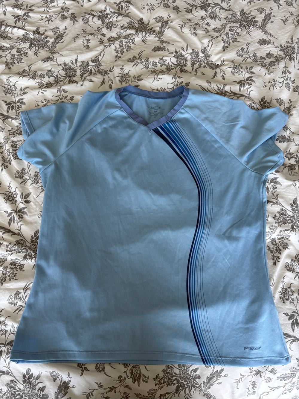 Patagonia Light Blue Athletic Top with Navy Stripe Accents size L